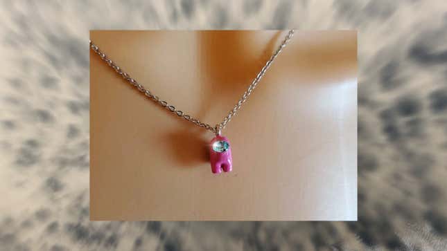 An image shows a necklace with a sparkly Crewmate-shaped charm.